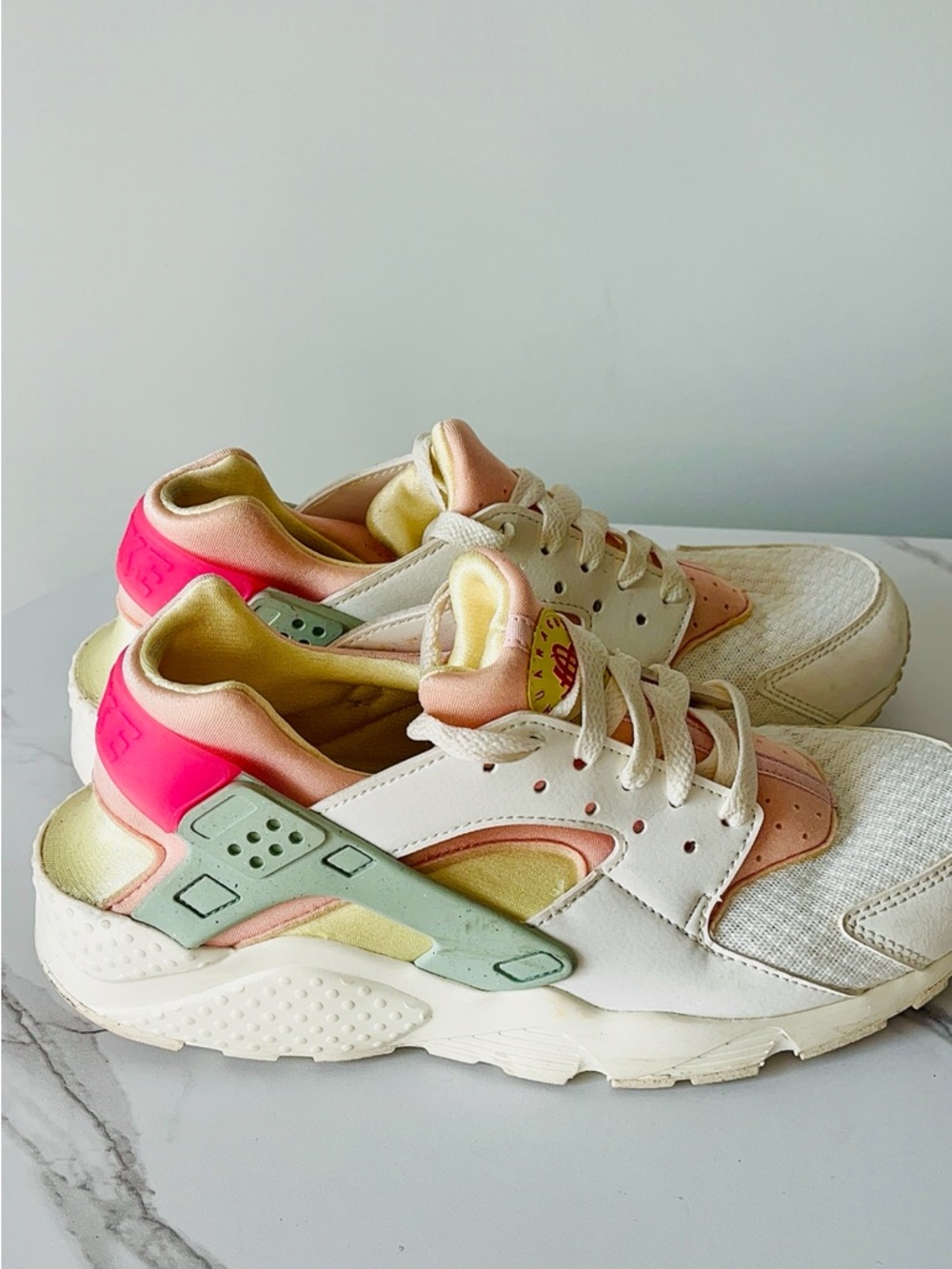 Nike Huarache Sneakers in White with Pink, Peach and Mint Accents
